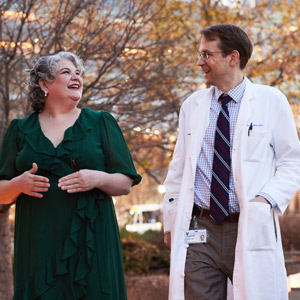 patient Jennifer and Dr. Strickler walking together