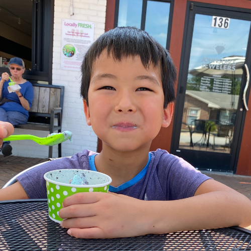 little boy eating ice cream