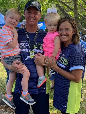 Janel and Troy with 2 grandkids after Triathlon 2019