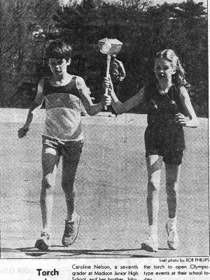 John and I carrying the torch to open our middle school Olympics at James Madison Jr. High!